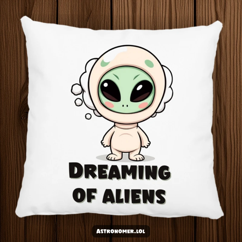 Funny pillow with a curious character’s thought bubble displaying a funny alien face, bringing humor and comfort to any room.