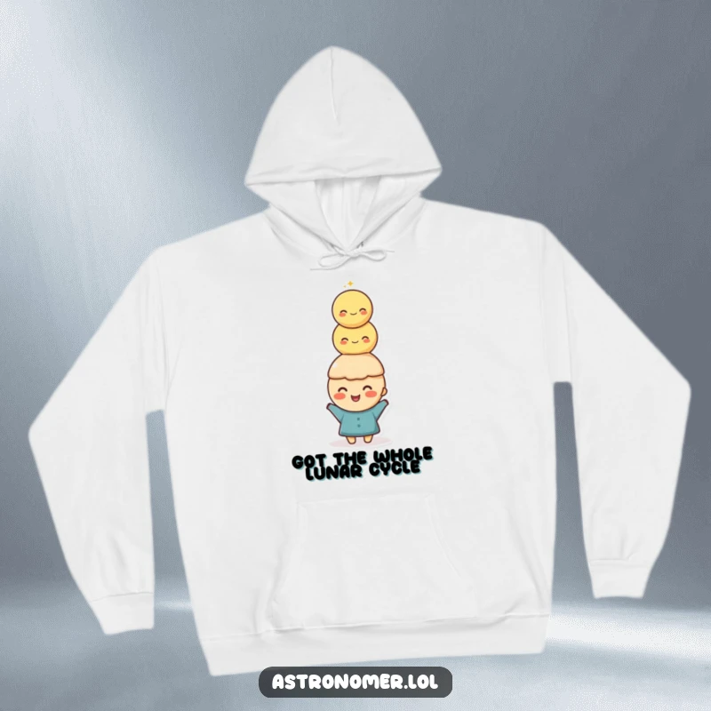 Funny Hoodie: A happy character is shown with a joyful expression, balancing a tall, precarious stack of moons on their head.