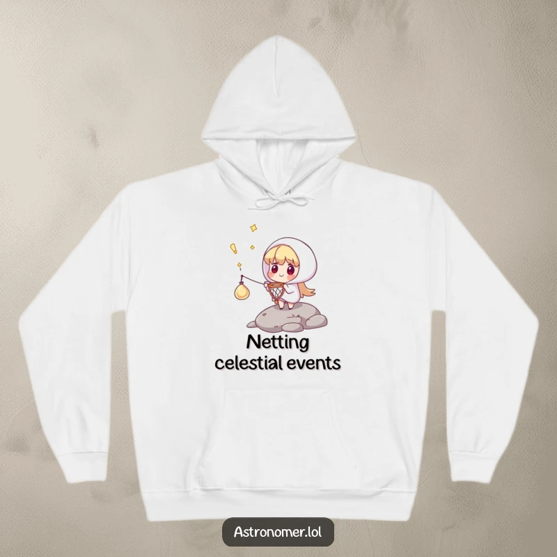 Funny hoodie depicting a character catching a falling comet with a tiny net, offering warmth and a humorous heroic theme.