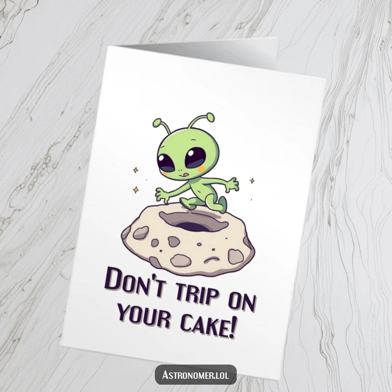 Funny Free Printable Birthday Card: A goofy alien comically tripping and flailing over a large moon crater.