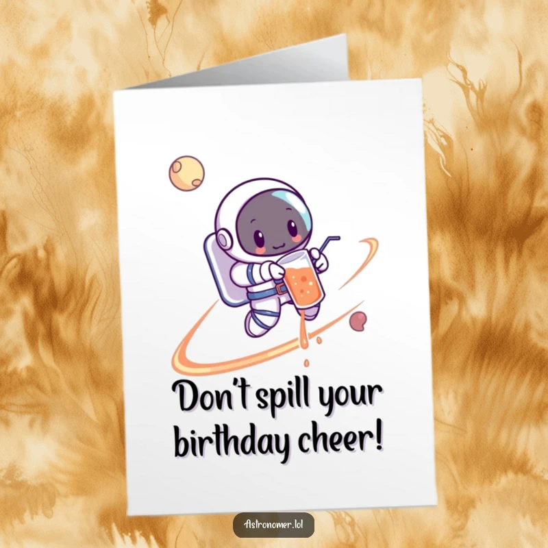 Funny Free Printable Birthday Card: Cartoon astronaut looking surprised as a drink spills while orbiting a colorful planet.