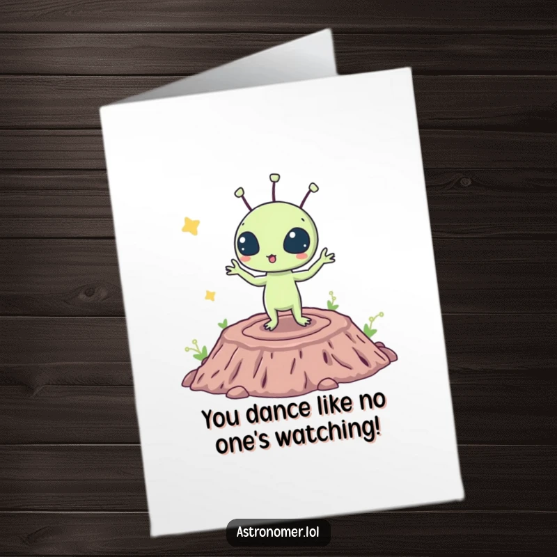 Funny Free Printable Congratulations Card: Surprised alien creature doing a silly dance on a crater, celebrating success with downloadable energy.