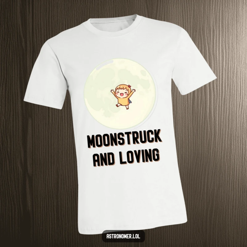 Funny t-shirt with an excited character orbiting a large moon with tiny outstretched arms, expressing pure lunar delight.