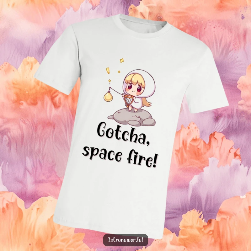 Funny t-shirt featuring a character using a comically tiny net to catch a falling comet, a humorous display of skill.