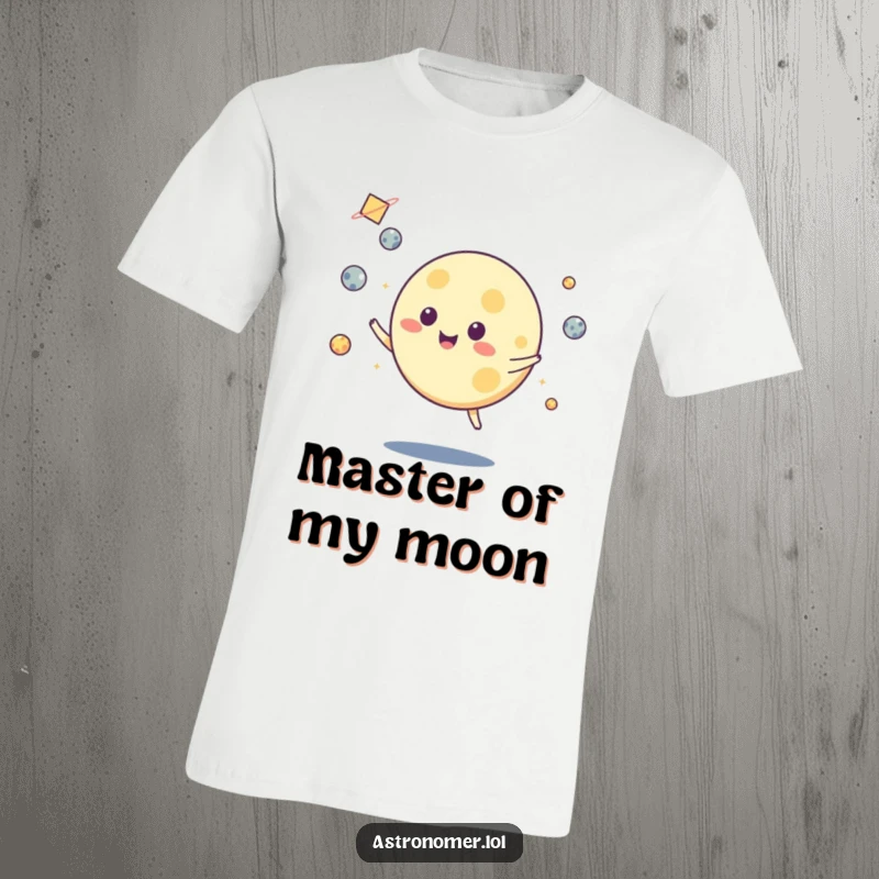 Funny t-shirt featuring a smiling moon character expertly juggling small, glowing asteroids in space, a whimsical design.