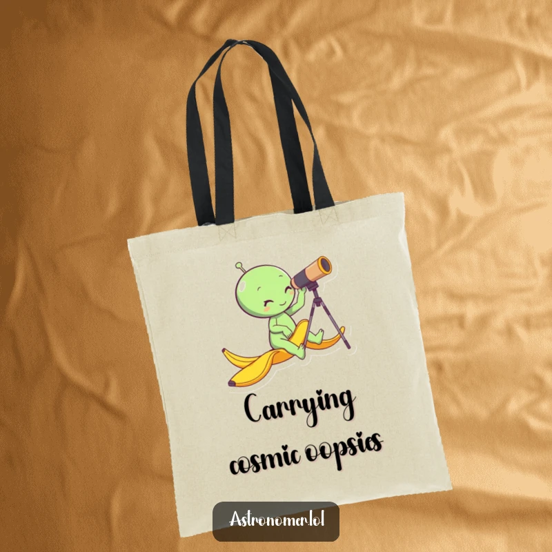 Funny alien slipping on a banana peel while looking through a telescope, practical and amusing space tote bag, gift idea.
