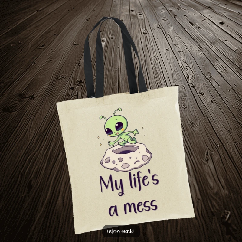 Funny Tote Bag: A goofy alien comically trips over a moon crater, perfect for carrying space gear.